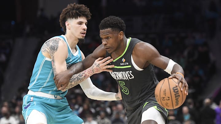 Mar 5, 2025; Charlotte, North Carolina, USA; Minnesota Timberwolves guard Anthony Edwards (5) drives past Charlotte Hornets guard LaMelo Ball (1) during the second half at the Spectrum Center. Mandatory Credit: Sam Sharpe-Imagn Images Mar 5, 2025; Charlotte, North Carolina, USA; Minnesota Timberwolves guard Anthony Edwards (5) drives past Charlotte Hornets guard LaMelo Ball (1) during the second half at the Spectrum Center. Mandatory Credit: Sam Sharpe-Imagn Images