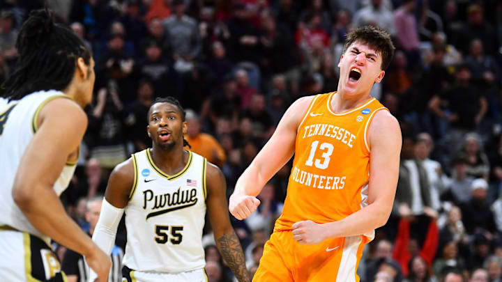 Tennessee forward J.P. Estrella (13) celebrates after dunking against Purdue in the second half of the NCAA Tournament Elite Eight college basketball game at Little Caesars Arena in Detroit, MI on Sunday, March 31, 2024. Tennessee forward J.P. Estrella (13) celebrates after dunking against Purdue in the second half of the NCAA Tournament Elite Eight college basketball game at Little Caesars Arena in Detroit, MI on Sunday, March 31, 2024.