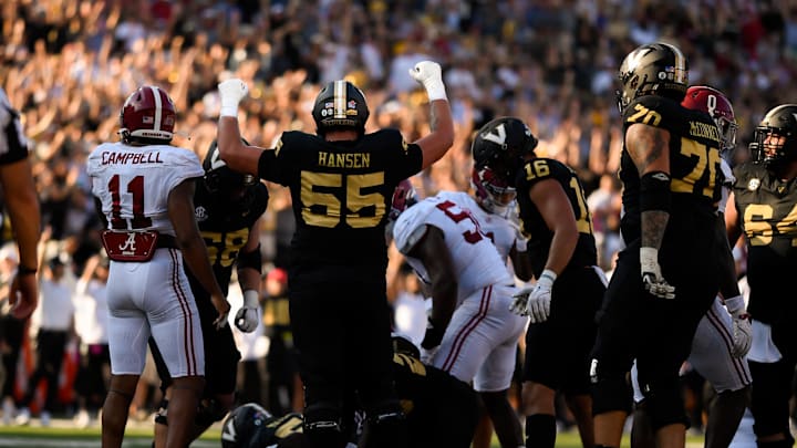 Oct 5, 2024; Nashville, Tennessee, USA;  Vanderbilt Commodores offensive lineman Gunnar Hansen (55) celebrates the touchdown of running back Sedrick Alexander (28) during the first half at FirstBank Stadium. Mandatory Credit: Steve Roberts-Imagn Images