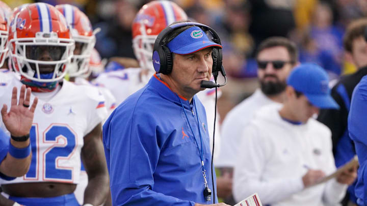 Nov 20, 2021; Columbia, Missouri, USA; Florida Gators head coach Dan Mullen watches play against the Missouri Tigers during the first half at Faurot Field at Memorial Stadium. Mandatory Credit: Denny Medley-Imagn Images