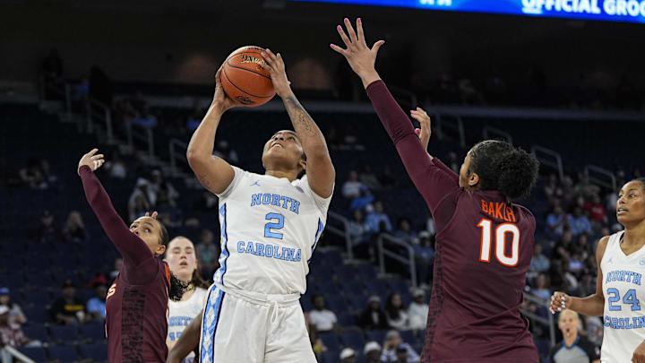 Mar 6, 2026; Duluth, GA, USA; North Carolina Tar Heels forward Nyla Harris (2) looks to shoot against Virginia Tech Hokies forward Carys Baker (10) at Gas South Arena. Mandatory Credit: Dale Zanine-Imagn Images