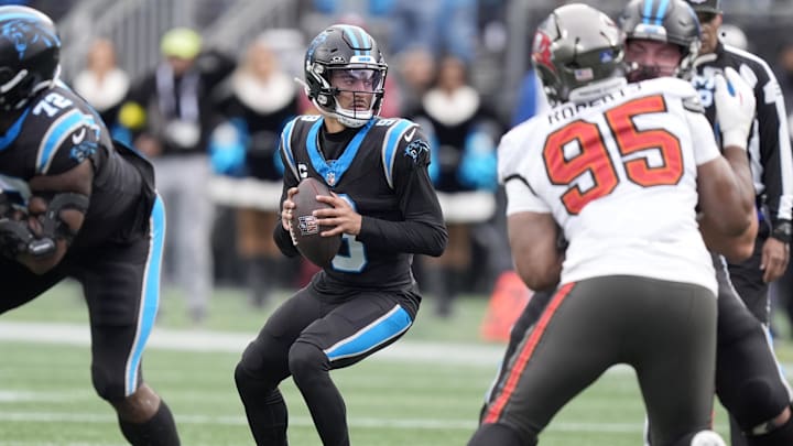 Dec 21, 2025; Charlotte, North Carolina, USA; Carolina Panthers quarterback Bryce Young (9) drops to throw during the first half against the Tampa Bay Buccaneers at Bank of America Stadium. Mandatory Credit: Jim Dedmon-Imagn Images