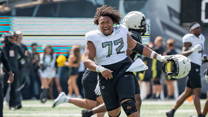 Fighting Ducks offensive lineman Iapani Laloulu celebrates as the Fighting Ducks face off against Mighty Oregon in the Oregon Ducks spring game on April 26, 2025, at Autzen Stadium in Eugene.