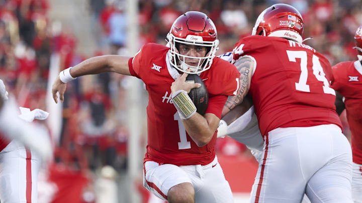 Houston Cougars quarterback Conner Weigman (1) runs with the ball during the first quarter against the Stephen F. Austin Lumberjacks.