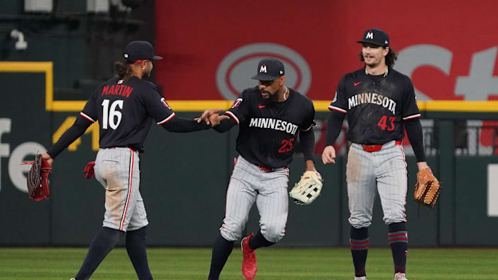 Sep 23, 2025; Arlington, Texas, USA; Minnesota Twins outfielder Austin Martin (16), Minnesota Twins outfielder Byron Buxton (25) and outfielder James Outman (43) react after the game against the Texas Rangers at Globe Life Field. Mandatory Credit: Raymond Carlin III-Imagn Images