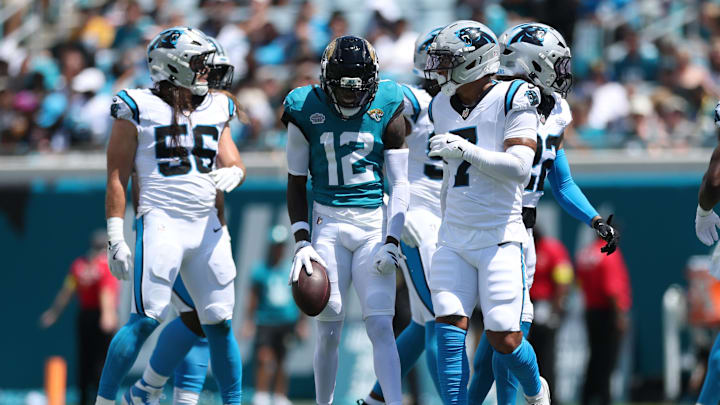 Sep 7, 2025; Jacksonville, Florida, USA; Jacksonville Jaguars wide receiver Travis Hunter (12) reacts after making a reception against the Carolina Panthers during the first half at EverBank Stadium. Mandatory Credit: Nathan Ray Seebeck-Imagn Images