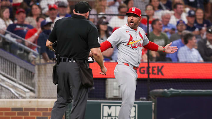 Apr 21, 2025; Atlanta, Georgia, USA; St. Louis Cardinals manager Oliver Marmol (37) argues with umpire Mark Carlson (8) against the Atlanta Braves in the eighth inning at Truist Park. Mandatory Credit: Brett Davis-Imagn Images