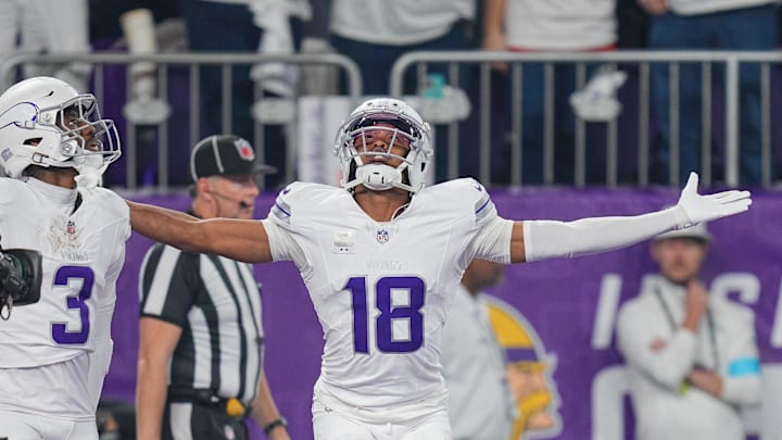 Dec 16, 2024; Minneapolis, Minnesota, USA; Minnesota Vikings wide receiver Justin Jefferson (18) celebrates his touchdown against the Chicago Bears in the first quarter at U.S. Bank Stadium. Mandatory Credit: Brad Rempel-Imagn Images
