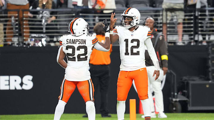 Nov 23, 2025; Paradise, Nevada, USA; Cleveland Browns quarterback Shedeur Sanders (12) celebrates with running back Dylan Sampson (22) after the two connected for a passing touchdown against the Las Vegas Raiders during the fourth quarter at Allegiant Stadium. Mandatory Credit: Stephen R. Sylvanie-Imagn Images