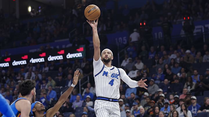 Feb 3, 2026; Oklahoma City, Oklahoma, USA; Orlando Magic guard Jalen Suggs (4) shoots against the Oklahoma City Thunder during the first quarter at Paycom Center. Mandatory Credit: Alonzo Adams-Imagn Images