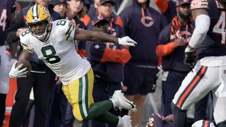 Green Bay Packers running back Josh Jacobs carries the ball against the Chicago Bears.