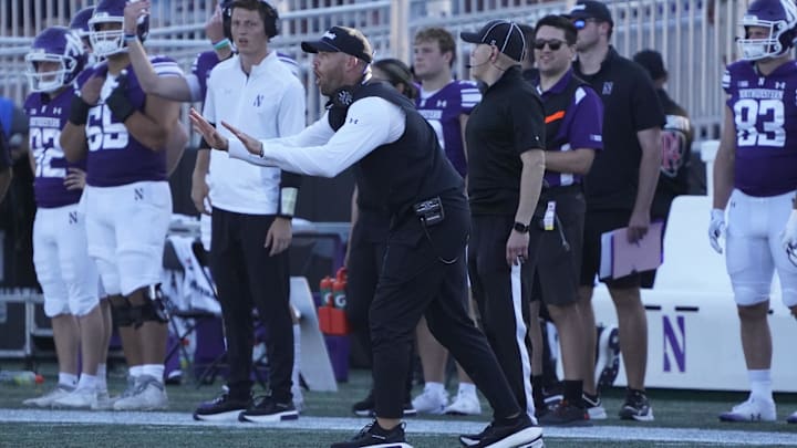 Aug 31, 2024; Evanston, Illinois, USA; Northwestern Wildcats head coach David Braun gestures to his team against the Miami (Oh) Redhawks during the second half at Lanny and Sharon Martin Stadium. Mandatory Credit: David Banks-Imagn Images