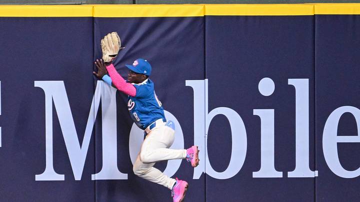 Aug 21, 2026; Milwaukee, Wisconsin, USA; Milwaukee Brewers center fielder Luis Lara (18) makes a leaping catch to rob Atlanta Braves first baseman Matt Olson (not pictured) of a hit in the sixth inning at American Family Field. Mandatory Credit: Benny Sieu-Imagn Images Aug 21, 2026; Milwaukee, Wisconsin, USA; Milwaukee Brewers center fielder Luis Lara (18) makes a leaping catch to rob Atlanta Braves first baseman Matt Olson (not pictured) of a hit in the sixth inning at American Family Field. Mandatory Credit: Benny Sieu-Imagn Images