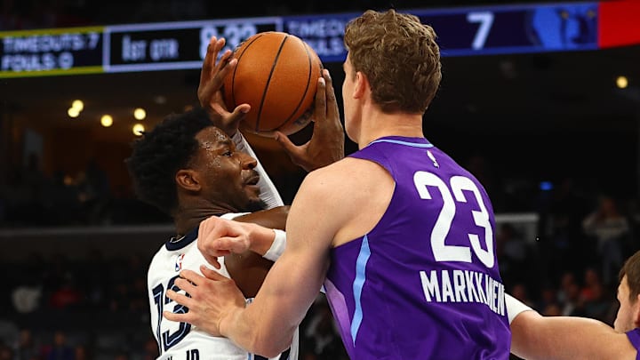 Jan 25, 2025; Memphis, Tennessee, USA; Memphis Grizzlies forward Jaren Jackson Jr. (13) drives to the basket against Utah Jazz forward Lauri Markkanen (23) during the first quarter at FedExForum. Mandatory Credit: Petre Thomas-Imagn Images Jan 25, 2025; Memphis, Tennessee, USA; Memphis Grizzlies forward Jaren Jackson Jr. (13) drives to the basket against Utah Jazz forward Lauri Markkanen (23) during the first quarter at FedExForum. Mandatory Credit: Petre Thomas-Imagn Images