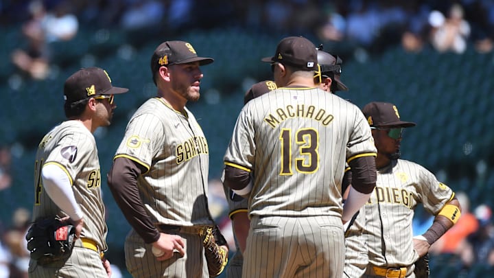 Aug 18, 2024; Denver, Colorado, USA; San Diego Padres pitcher Joe Musgrove (44) talks with teammates after allowing a run in the third inning against the Colorado Rockies at Coors Field. Mandatory Credit: Christopher Hanewinckel-Imagn Images