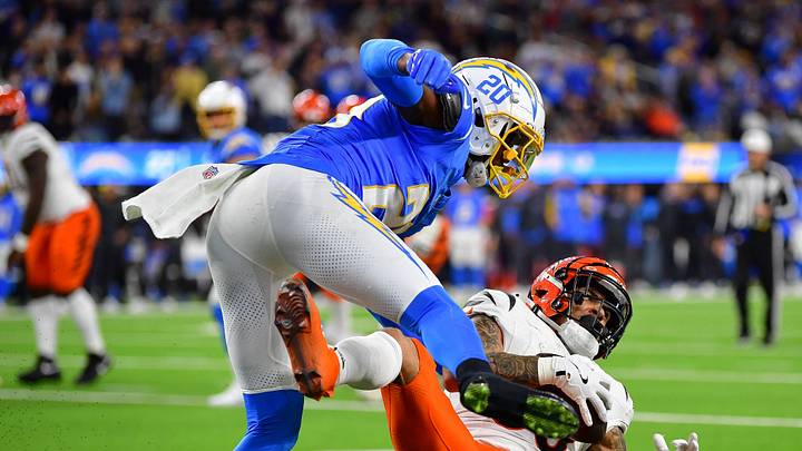 Nov 17, 2024; Inglewood, California, USA; Los Angeles Chargers cornerback Cam Hart (20) hits Cincinnati Bengals running back Chase Brown (30) during the second half at SoFi Stadium. Mandatory Credit: Gary A. Vasquez-Imagn Images Nov 17, 2024; Inglewood, California, USA; Los Angeles Chargers cornerback Cam Hart (20) hits Cincinnati Bengals running back Chase Brown (30) during the second half at SoFi Stadium. Mandatory Credit: Gary A. Vasquez-Imagn Images