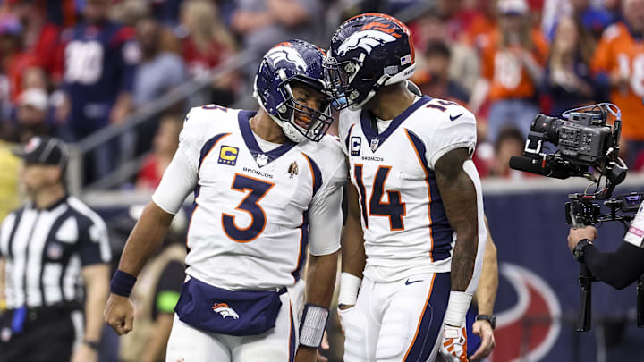 Dec 3, 2023; Houston, Texas, USA; Denver Broncos quarterback Russell Wilson (3) and wide receiver