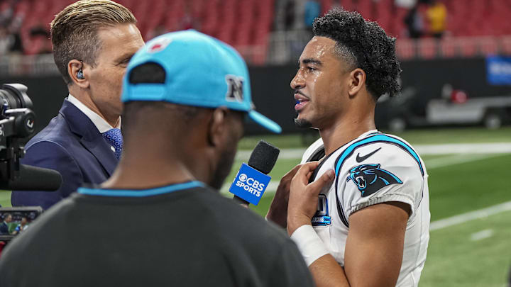 Jan 5, 2025; Atlanta, Georgia, USA; Carolina Panthers quarterback Bryce Young (9) is interviewed on the field after defeating the Atlanta Falcons in overtime at Mercedes-Benz Stadium. Mandatory Credit: Dale Zanine-Imagn Images