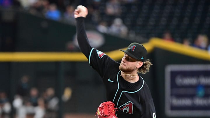 Aug 29, 2024; Phoenix, Arizona, USA;  Arizona Diamondbacks pitcher Ryne Nelson (19) throws in the first inning against the New York Mets at Chase Field. Mandatory Credit: Matt Kartozian-Imagn Images