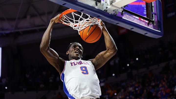 Jan 7, 2025; Gainesville, Florida, USA; Florida Gators center Rueben Chinyelu (9) dunks the ball against the Tennessee Volunteers during the second half at Exactech Arena at the Stephen C. O'Connell Center. Mandatory Credit: Matt Pendleton-Imagn Images