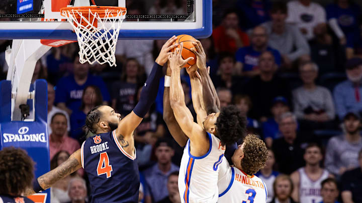 Feb 10, 2024; Gainesville, Florida, USA; Florida Gators guard Zyon Pullin (0) and center Micah