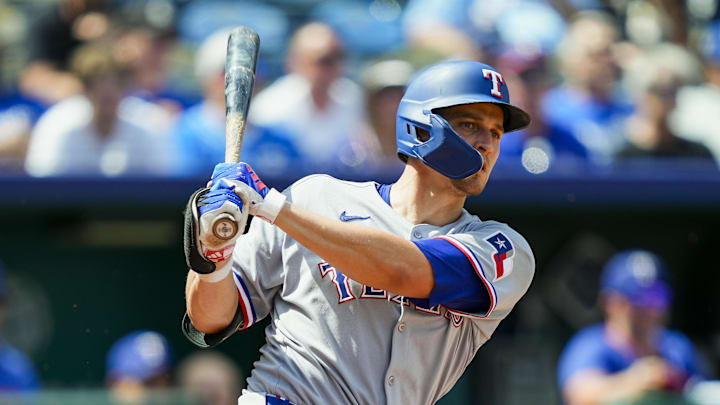 Texas Rangers shortstop Corey Seager (5) bats during the sixth inning against the Kansas City Royals at Kauffman Stadium. 