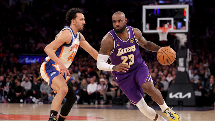 Feb 1, 2026; New York, New York, USA; Los Angeles Lakers forward LeBron James (23) controls the ball against New York Knicks guard Landry Shamet (44) during the third quarter at Madison Square Garden. Mandatory Credit: Brad Penner-Imagn Images