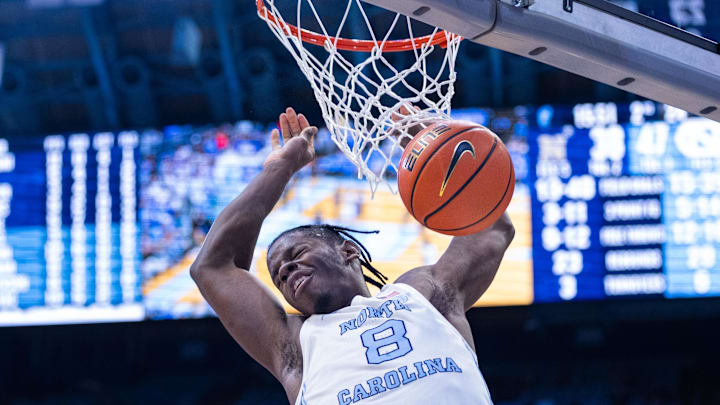 Nov 18, 2025; Chapel Hill, North Carolina, USA; North Carolina Tar Heels forward Caleb Wilson (8) dunks against the Navy Midshipmen during the second half at Dean E. Smith Center. 