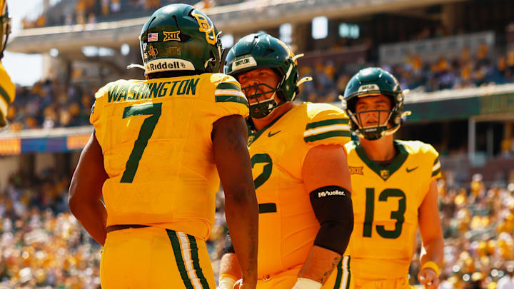 Oct 4, 2025; Waco, Texas, USA;  Baylor Bears running back Bryson Washington (7) celebrates with offensive lineman Coleton Price (72) and quarterback 
Sawyer Robertson (13) after scoring a touchdown against the Kansas State Wildcats during the second half at McLane Stadium. Mandatory Credit: Chris Jones-Imagn Images