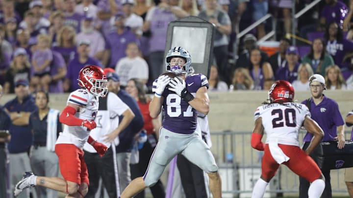 Kansas State Wildcats tight end Brayden Loftin (87) makes a catch during the third quarter of the game against Arizona at Bill Snyder Family Stadium on Friday, September 13, 2024. Kansas State Wildcats tight end Brayden Loftin (87) makes a catch during the third quarter of the game against Arizona at Bill Snyder Family Stadium on Friday, September 13, 2024.