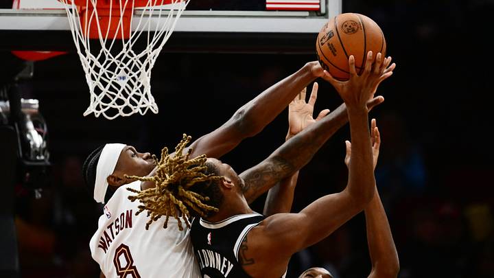 Oct 24, 2026; Cleveland, Ohio, USA; Brooklyn Nets forward Noah Clowney (21) drives to the basket against Cleveland Cavaliers guard Peyton Watson (8) and center Evan Mobley (4) during the second half at Rocket Arena. Mandatory Credit: Ken Blaze-Imagn Images Oct 24, 2026; Cleveland, Ohio, USA; Brooklyn Nets forward Noah Clowney (21) drives to the basket against Cleveland Cavaliers guard Peyton Watson (8) and center Evan Mobley (4) during the second half at Rocket Arena. Mandatory Credit: Ken Blaze-Imagn Images