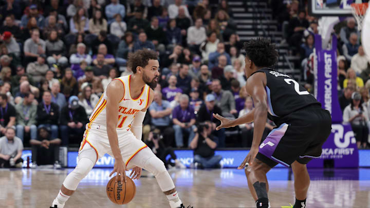 Jan 7, 2025; Salt Lake City, Utah, USA; Atlanta Hawks guard Trae Young (11) keeps the ball from Utah Jazz guard Collin Sexton (2) during the second quarter at Delta Center. Mandatory Credit: Chris Nicoll-Imagn Images Jan 7, 2025; Salt Lake City, Utah, USA; Atlanta Hawks guard Trae Young (11) keeps the ball from Utah Jazz guard Collin Sexton (2) during the second quarter at Delta Center. Mandatory Credit: Chris Nicoll-Imagn Images