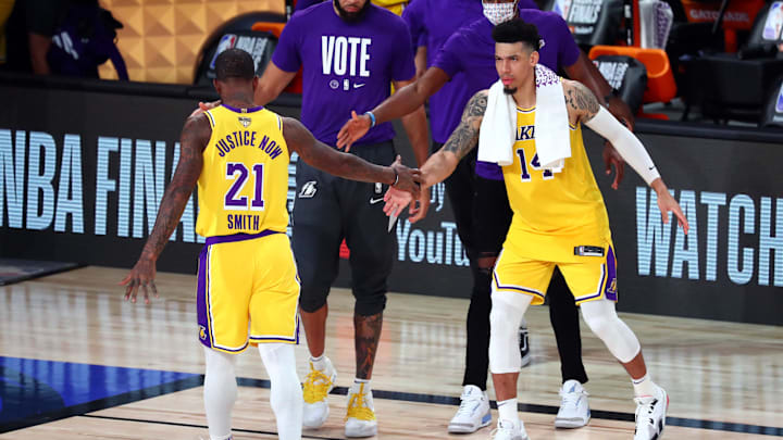 Sep 30, 2020; Orlando, Florida, USA; Los Angeles Lakers guard JR Smith (21) celebrates with guard Danny Green (14) during the fourth quarter against the Miami Heat in game one of the 2020 NBA Finals at AdventHealth Arena. Mandatory Credit: Kim Klement-Imagn Images Sep 30, 2020; Orlando, Florida, USA; Los Angeles Lakers guard JR Smith (21) celebrates with guard Danny Green (14) during the fourth quarter against the Miami Heat in game one of the 2020 NBA Finals at AdventHealth Arena. Mandatory Credit: Kim Klement-Imagn Images