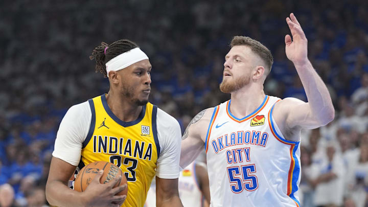 Jun 16, 2025; Oklahoma City, Oklahoma, USA; Indiana Pacers center Myles Turner (33) drives to the basket against Oklahoma City Thunder center Isaiah Hartenstein (55) during the second quarter of game five of the 2025 NBA Finals at Paycom Center. Mandatory Credit: Kyle Terada-Imagn Images
