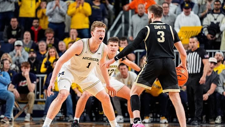 Michigan center Danny Wolf (1) defends Purdue guard Braden Smith (3) during the first half at Crisler Center in Ann Arbor on Tuesday, Feb. 11, 2025.