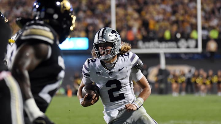 Oct 12, 2024; Boulder, Colorado, USA; Kansas State Wildcats quarterback Avery Johnson (2) runs for a touchdown during the first half against the Colorado Buffaloes at Folsom Field. Mandatory Credit: Christopher Hanewinckel-Imagn Images Oct 12, 2024; Boulder, Colorado, USA; Kansas State Wildcats quarterback Avery Johnson (2) runs for a touchdown during the first half against the Colorado Buffaloes at Folsom Field. Mandatory Credit: Christopher Hanewinckel-Imagn Images