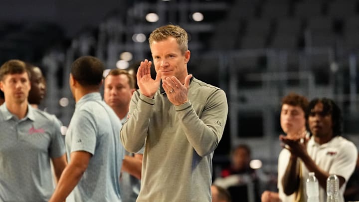 Mar 16, 2024; Fort Worth, TX, USA;  Florida Atlantic Owls head coach Dusty May reacts after a play