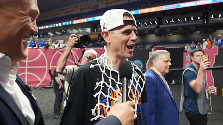 Apr 7, 2025; San Antonio, TX, USA; Florida Gators head coach Todd Golden is interviewed after winning the national championship game of the Final Four of the 2025 NCAA Tournament at the Alamodome. Mandatory Credit: Bob Donnan-Imagn Images Apr 7, 2025; San Antonio, TX, USA; Florida Gators head coach Todd Golden is interviewed after winning the national championship game of the Final Four of the 2025 NCAA Tournament at the Alamodome. Mandatory Credit: Bob Donnan-Imagn Images