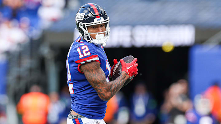 Former New York Giants tight end Darren Waller (12) catches the ball during the first half Washington Commanders at MetLife Stadium. 