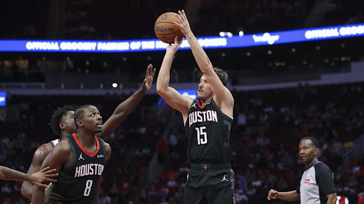 Houston Rockets guard Reed Sheppard shoots the ball during the fourth quarter against the Los Angeles Clippers at Toyota Center. Mandatory Credit: Troy Taormina-Imagn Images