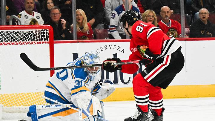 Oct 6, 2026; Chicago, Illinois, USA;  St. Louis Blues goaltender Joel Hofer (30) defends against Chicago Blackhawks center Frank Nazar (91)  during the first period at United Center.  Mandatory Credit: Matt Marton-Imagn Images