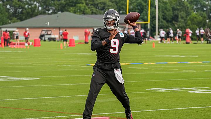 Jul 29, 2026; Atlanta, Falcons, USA; Atlanta Falcons quarterback Michael Penix Jr passes during the first day of training camp at IBM Performance Field. Mandatory Credit: Dale Zanine-Imagn Images
