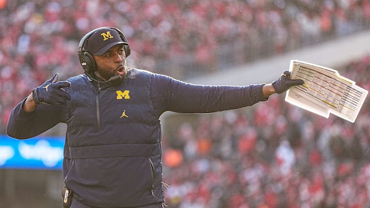 Michigan head coach Sherrone Moore celebrates after place kicker Dominic Zvada scores a field goal against Ohio State during the second half at Ohio Stadium in Columbus, Ohio on Saturday, Nov. 30, 2024.