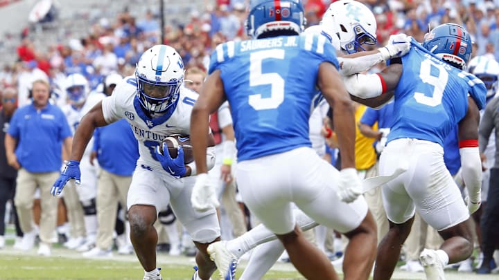 Sep 28, 2024; Oxford, Mississippi, USA; Kentucky Wildcats running back Demie Sumo-Karngbaye (0) runs the ball during the first half against the Mississippi Rebels at Vaught-Hemingway Stadium. Mandatory Credit: Petre Thomas-Imagn Images