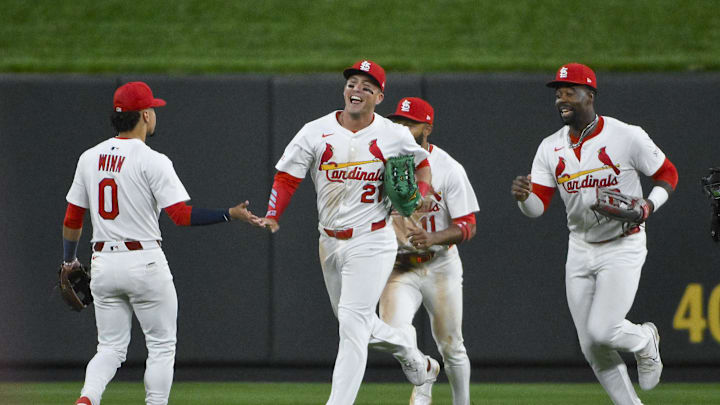 May 6, 2025; St. Louis, Missouri, USA; St. Louis Cardinals left fielder Lars Nootbaar (21) shortstop Masyn Winn (0) center fielder Victor Scott II (11) and right fielder Jordan Walker (18) celebrate after the Cardinals defeated the Pittsburgh Pirates at Busch Stadium. Mandatory Credit: Jeff Curry-Imagn Images May 6, 2025; St. Louis, Missouri, USA; St. Louis Cardinals left fielder Lars Nootbaar (21) shortstop Masyn Winn (0) center fielder Victor Scott II (11) and right fielder Jordan Walker (18) celebrate after the Cardinals defeated the Pittsburgh Pirates at Busch Stadium. Mandatory Credit: Jeff Curry-Imagn Images