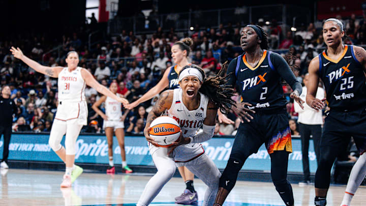 Jul 27, 2025; Washington, District of Columbia, USA; Washington Mystics guard Sug Sutton (1) prepares to shoot the ball while Phoenix Mercury guard Kahleah Copper (2) defends in the first half at CareFirst Arena. Mandatory Credit: Emily Faith Morgan-Imagn Images Jul 27, 2025; Washington, District of Columbia, USA; Washington Mystics guard Sug Sutton (1) prepares to shoot the ball while Phoenix Mercury guard Kahleah Copper (2) defends in the first half at CareFirst Arena. Mandatory Credit: Emily Faith Morgan-Imagn Images