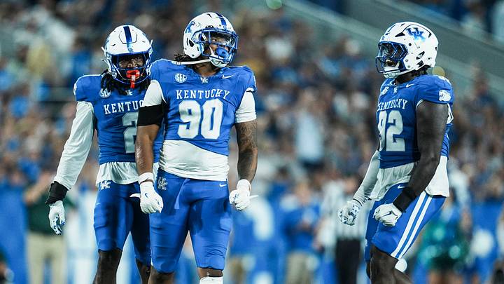 Kentucky Wildcats defensive lineman Mi'Quise Humphrey-Grace (90), celebrates with Kentucky Wildcats defensive lineman Kahlil Saunders (92) after making a sack on Eastern Michigan quarter back Noah Kim during the Wildcats' 48-23 win at Kroger Field in Lexington, Kentucky Saturday, Sept. 13, 2025. Kentucky Wildcats defensive lineman Mi'Quise Humphrey-Grace (90), celebrates with Kentucky Wildcats defensive lineman Kahlil Saunders (92) after making a sack on Eastern Michigan quarter back Noah Kim during the Wildcats' 48-23 win at Kroger Field in Lexington, Kentucky Saturday, Sept. 13, 2025.