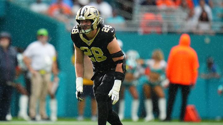 Nov 30, 2025; Miami Gardens, Florida, USA; New Orleans Saints linebacker Danny Stutsman (28) stands at the line of scrimmage prior to the snap against the Miami Dolphins during the second half at Hard Rock Stadium. Mandatory Credit: Rich Storry-Imagn Images Nov 30, 2025; Miami Gardens, Florida, USA; New Orleans Saints linebacker Danny Stutsman (28) stands at the line of scrimmage prior to the snap against the Miami Dolphins during the second half at Hard Rock Stadium. Mandatory Credit: Rich Storry-Imagn Images