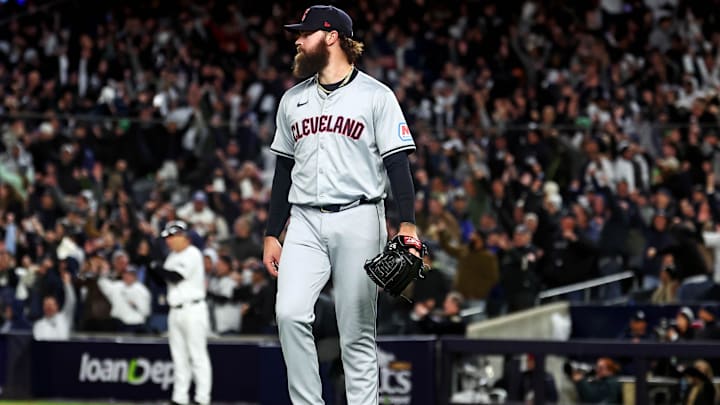 Oct 15, 2024; Bronx, New York, USA; Cleveland Guardians pitcher Hunter Gaddis (33) reacts after giving up a three run home run to New York Yankees outfielder Aaron Judge (99) during the seventh inning in game two of the ALCS for the 2024 MLB Playoffs at Yankee Stadium. Mandatory Credit: Vincent Carchietta-Imagn Images