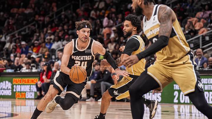 Feb 26, 2026; Atlanta, Georgia, USA; Atlanta Hawks forward Corey Kispert (24) dribbles towards the basket against the Washington Wizards during the second half at State Farm Arena. Mandatory Credit: Dale Zanine-Imagn Images